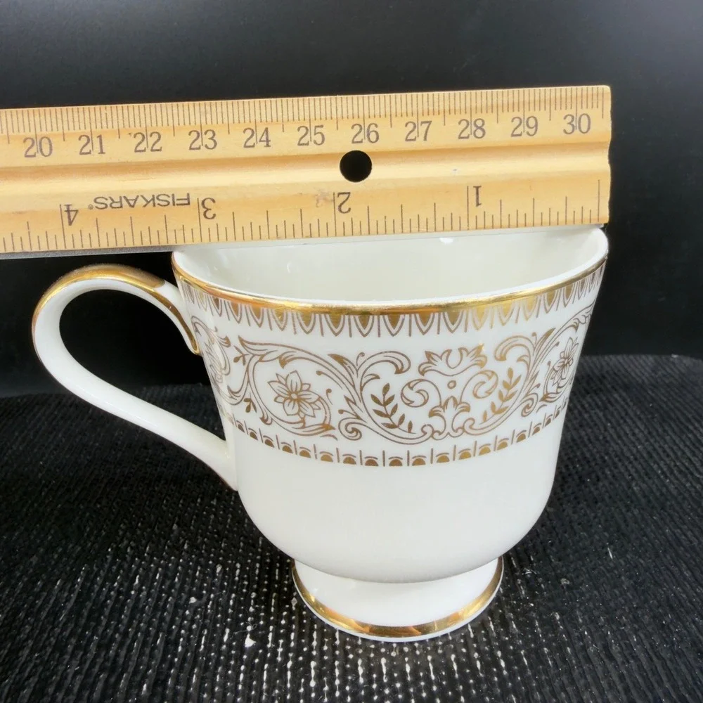 Royal Castle Goldaccent Ivory China Tea Cup and Saucer Set Gold Trim Made‎ Japan